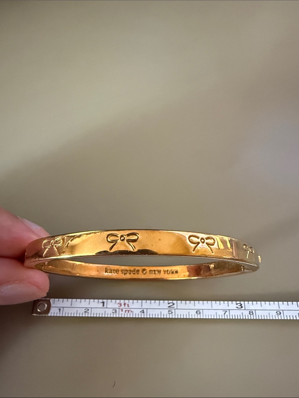 kate spade Gold Bow-Embossed Bangle Bracelet